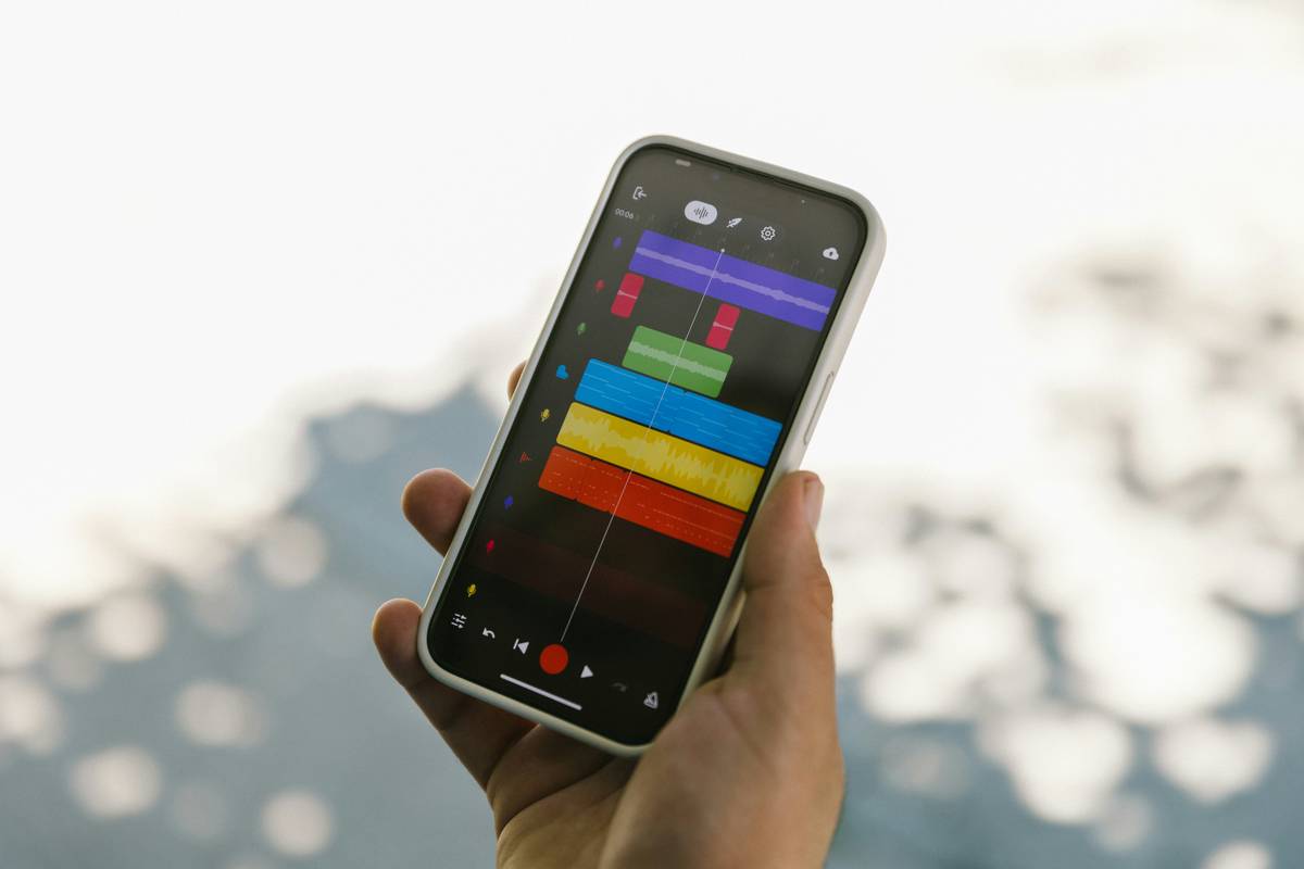 Photo collage of smiling users holding their phones displaying stress management apps