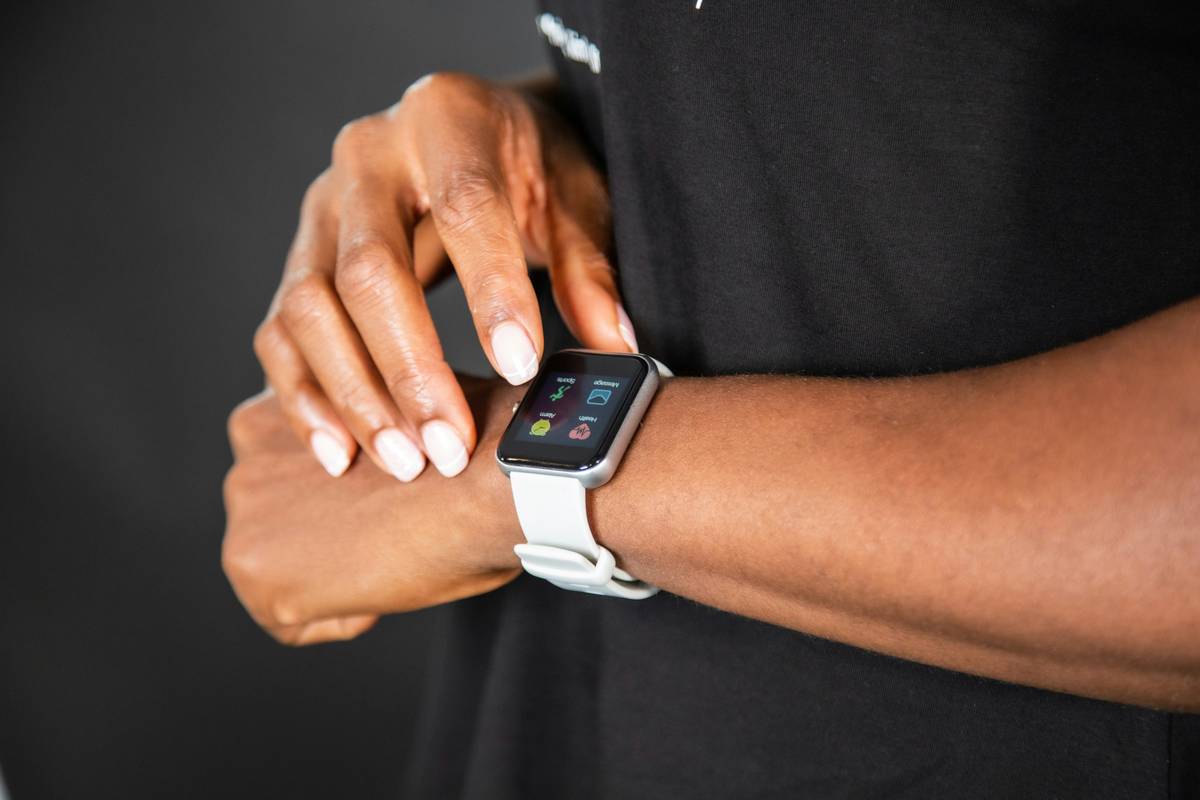 Black woman wearing April Laugh Fitness Watch.
