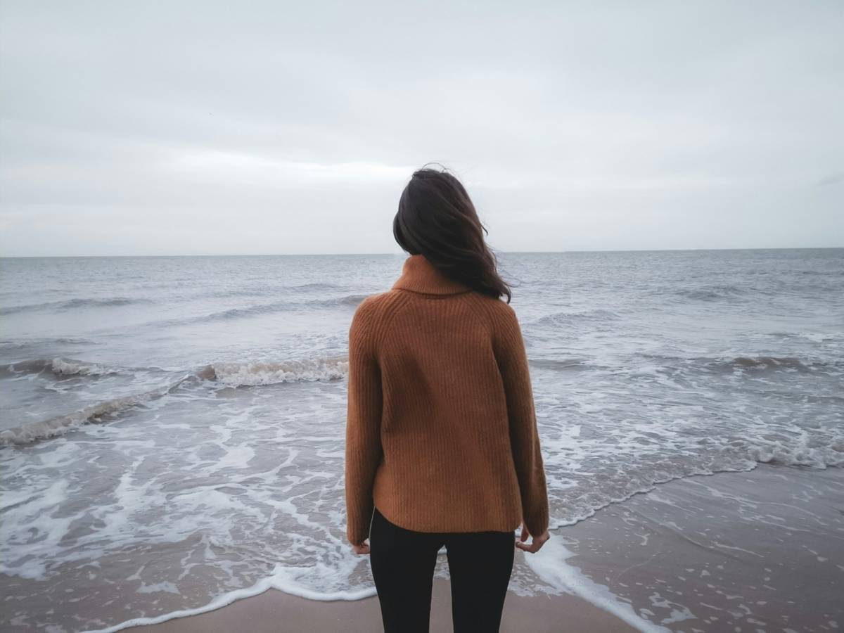 Girl looking towards the sea