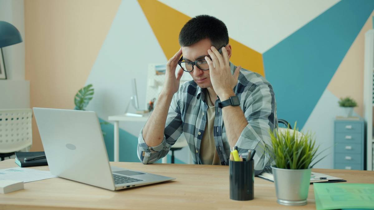 Infographic showing 83% of U.S. workers report work-related stress; top causes include workload (59%), interpersonal conflict (41%), and lack of control (37%) per American Institute of Stress 2023 data