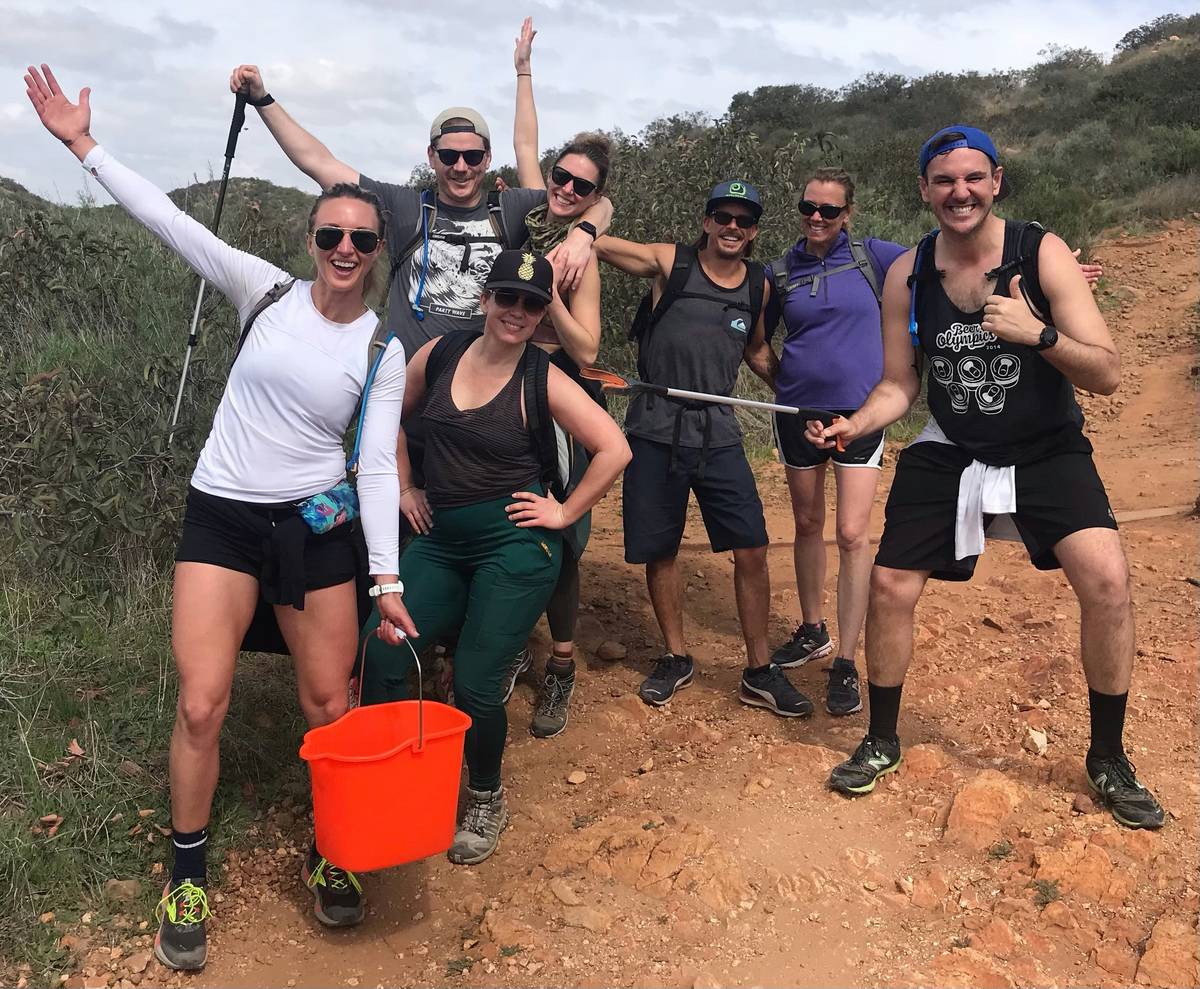 Earth Day CleanUp. Great Global CleanUp. Seven people holding buckets and litter getters. Employee engagement